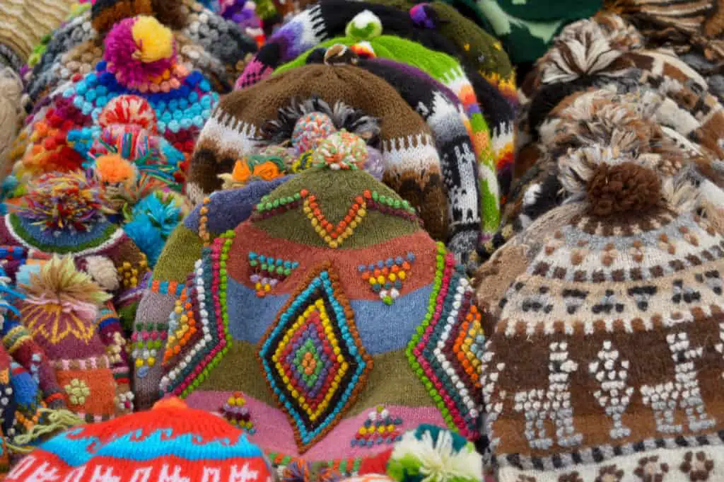 Woolen hats with typical peruvian design, these hats were sold at a market in pisaq. Very colorful and detailed.