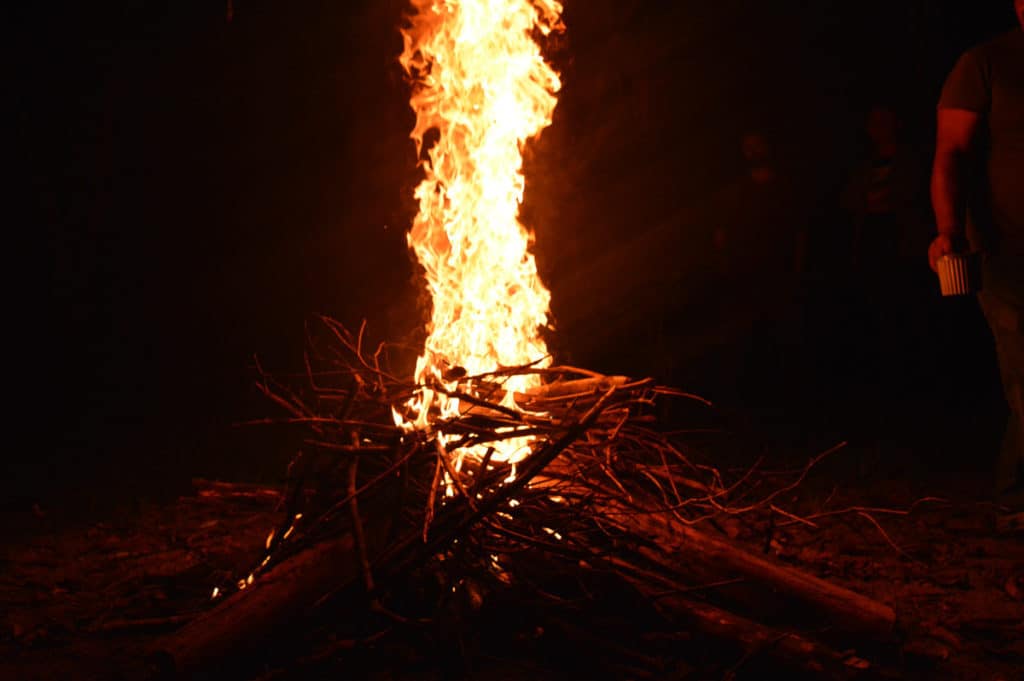 Campfire in the dark. Alpaca wool is flame retardant and self-extinguishing. It also doesn't melt when it catches fire!