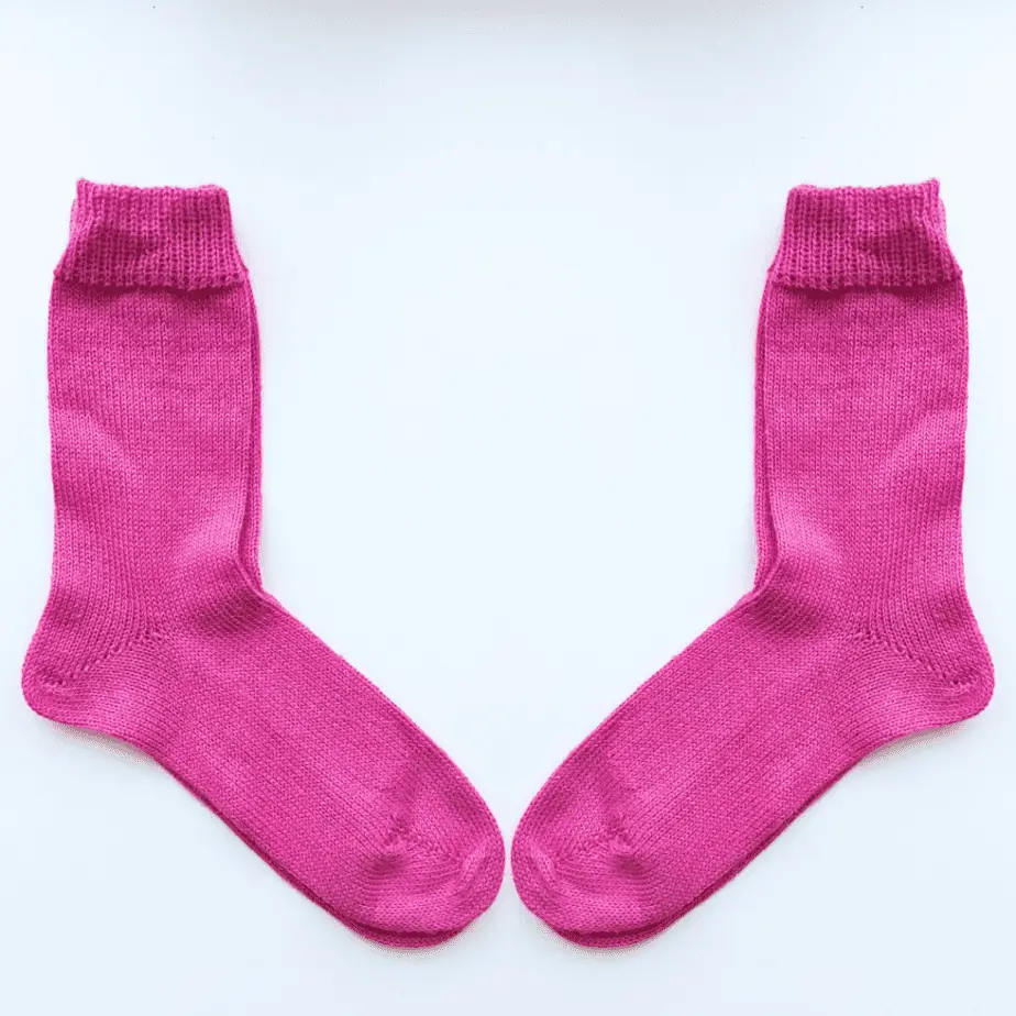 Pair of Pink knitted socks, made with 100% alpaca wool. 